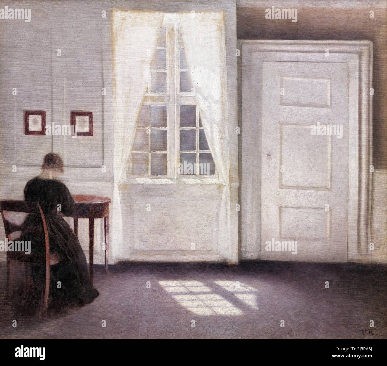 'A Room in the Artist's Home in Strandgade, Copenhagen, with the Artist's Wife' by the Danish artist, Vilhelm Hammershoi (1864-1916), oil on canvas, 1901 Stock Photo