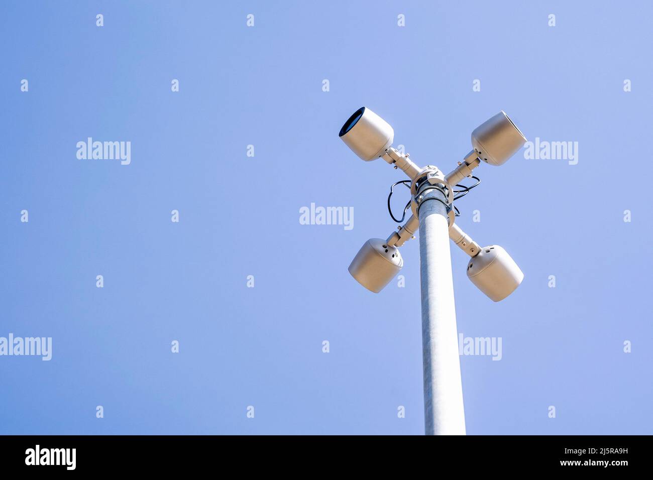 a surveillance camera on a pole in a public place. CCTV camera Stock Photo Alamy