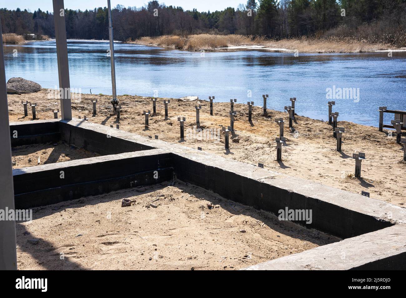 ribbon concrete foundation for the construction of a boat station Stock