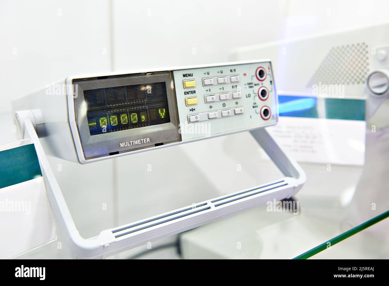 Universal portable desktop voltmeter in store Stock Photo
