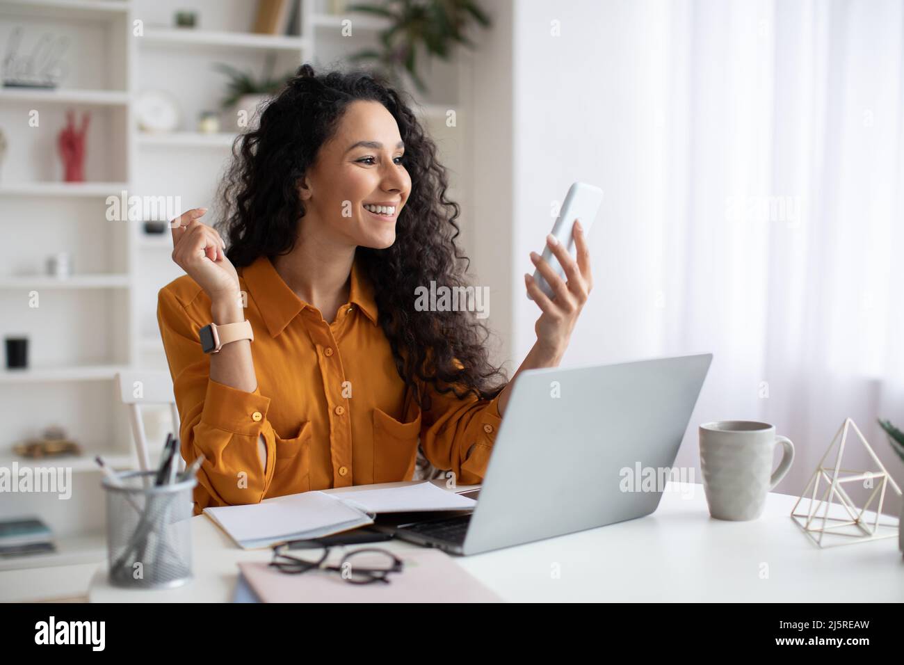 Cheerful arabic woman using hi-res stock photography and images - Alamy
