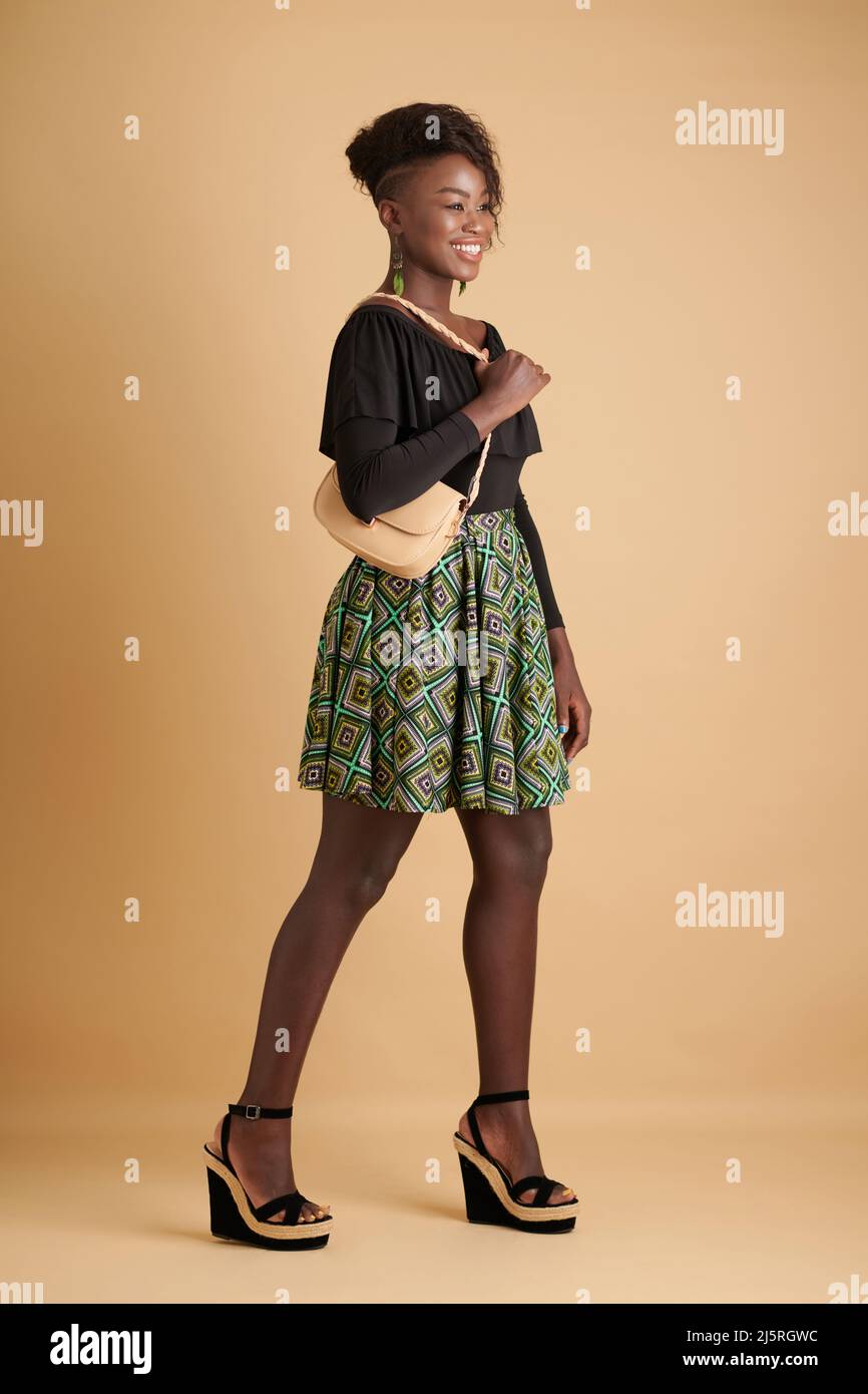 Woman wearing short skirt hi-res stock photography and images - Alamy