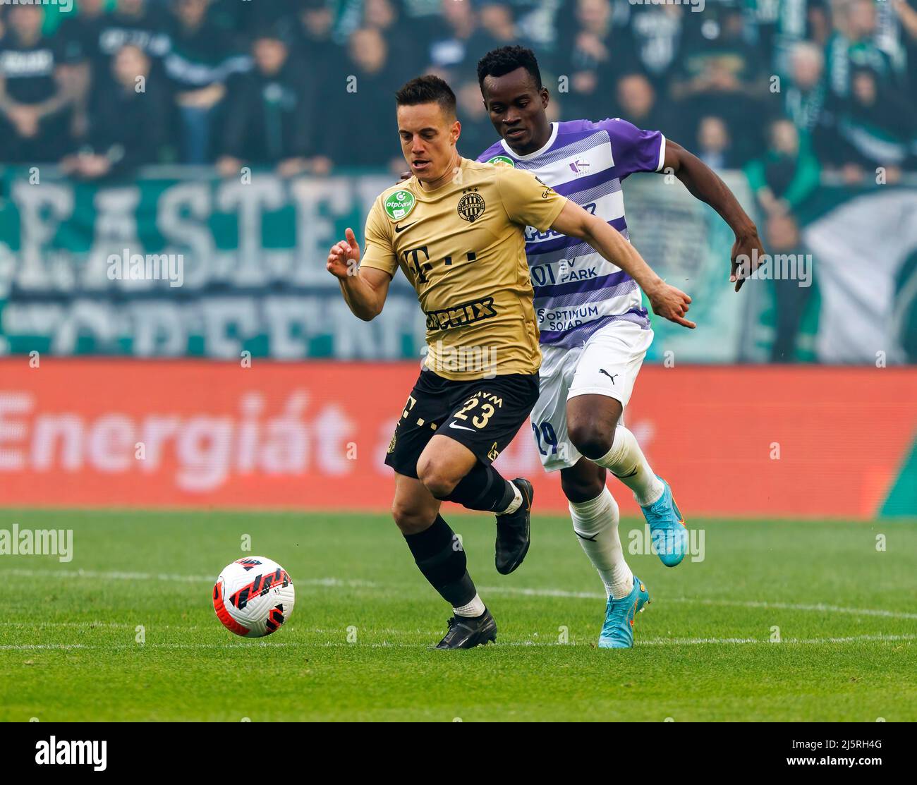 BUDAPEST, HUNGARY - MAY 11: Kristoffer Zachariassen of Ferencvarosi TC runs  with the ball during the Hungarian Cup Final match between Ferencvarosi TC  and Paksi FC at Puskas Arena on May 11