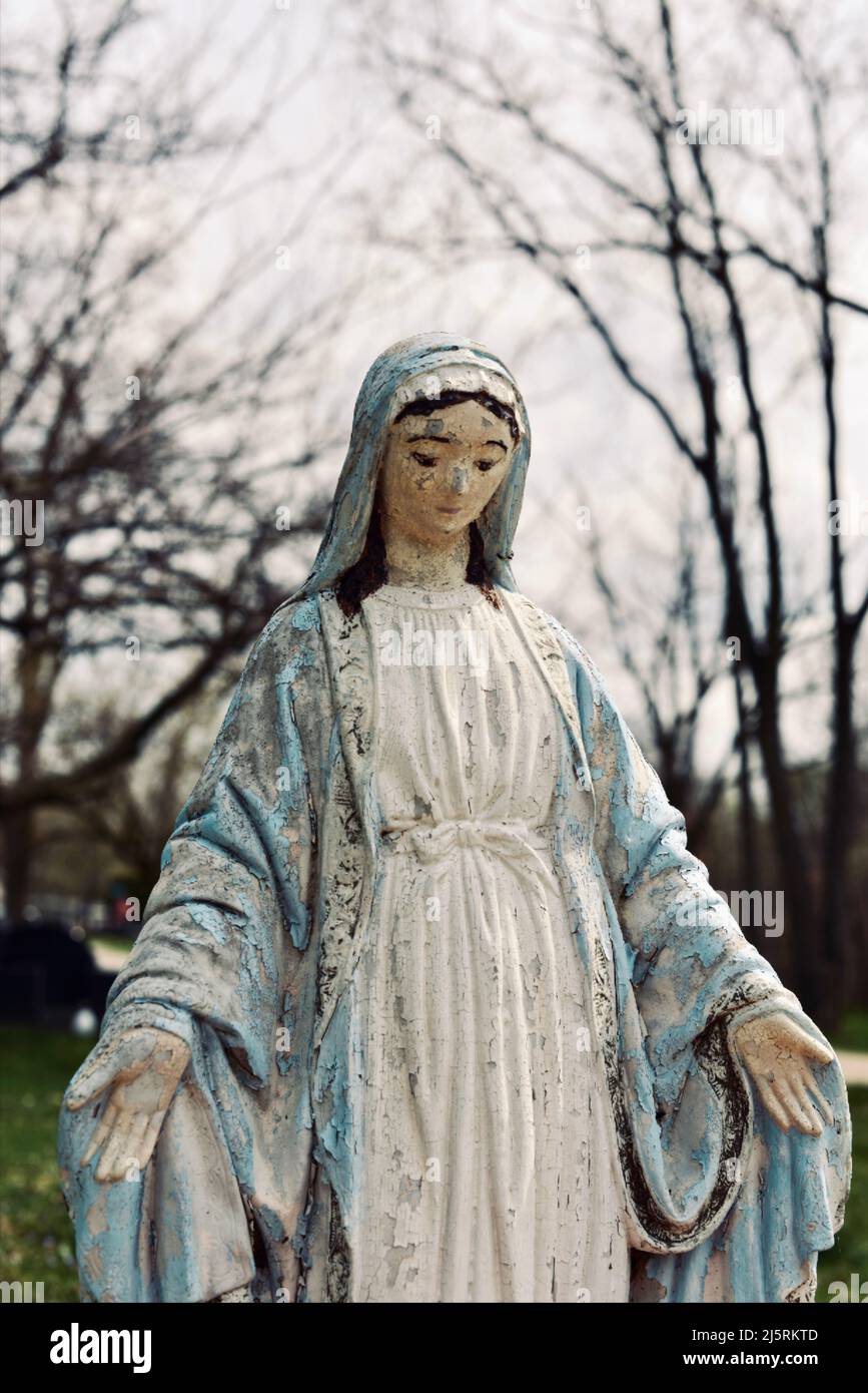 Female Stone Statue In A Cemetery In Winter Stock Photo Alamy