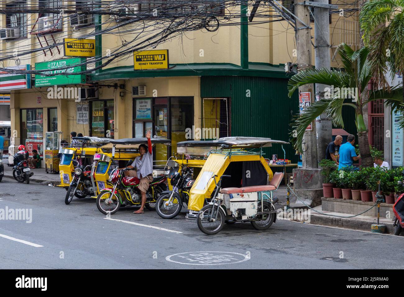 Tricycle in Manila, Philippines - 08.11.2019 Stock Photo
