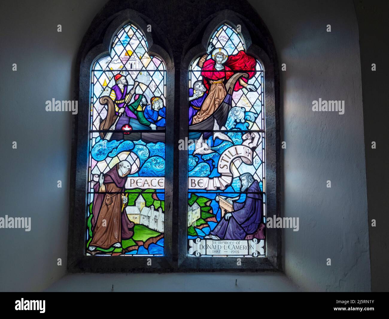 A stained glass window in a church at Penmon on Anglesey, Wales, UK