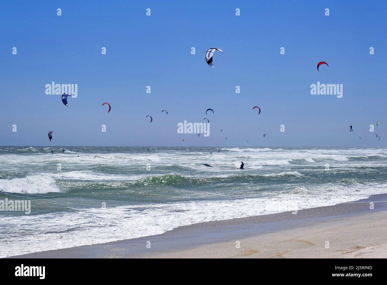 Kitesurfers / kiteboarders at Bloubergstrand along the Atlantic Ocean shores of Table Bay near Cape Town / Kaapstad, Western Cape, South Africa Stock Photo