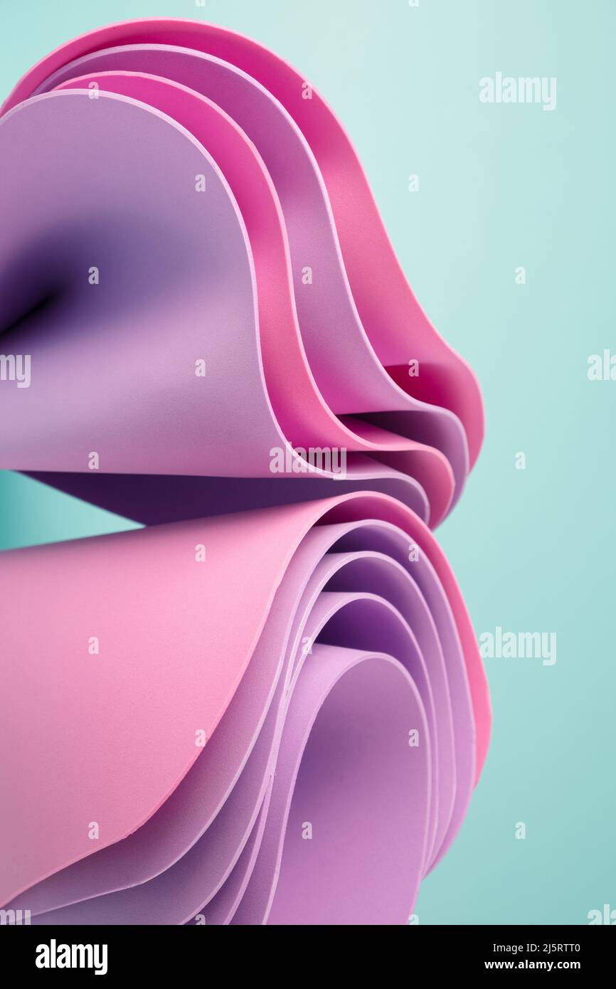 background of pink and violet pastel sheets of paper Stock Photo