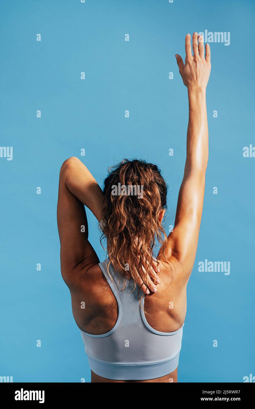 Muscular woman rear view hi-res stock photography and images - Alamy