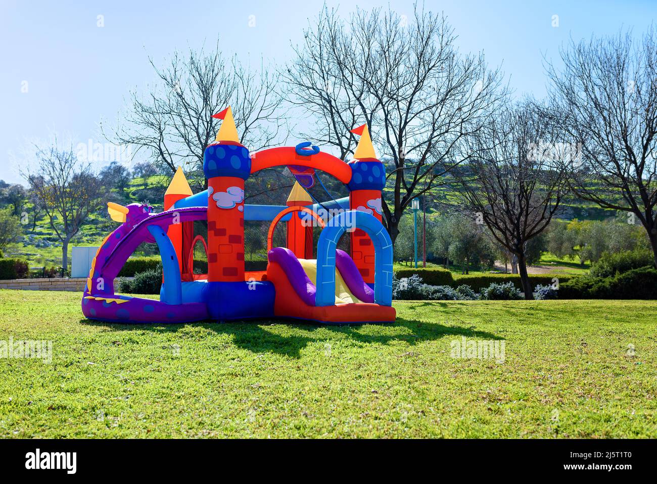 Inflatable castle outdoor at sunny summer day. Stock Photo