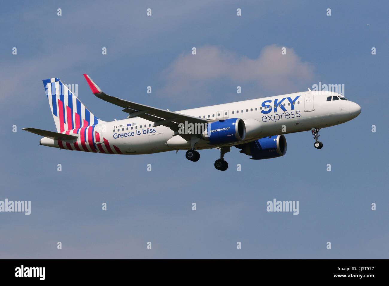 An Airbus A320 NEO operated by Sky Express arrives at London Heathrow Airport Stock Photo