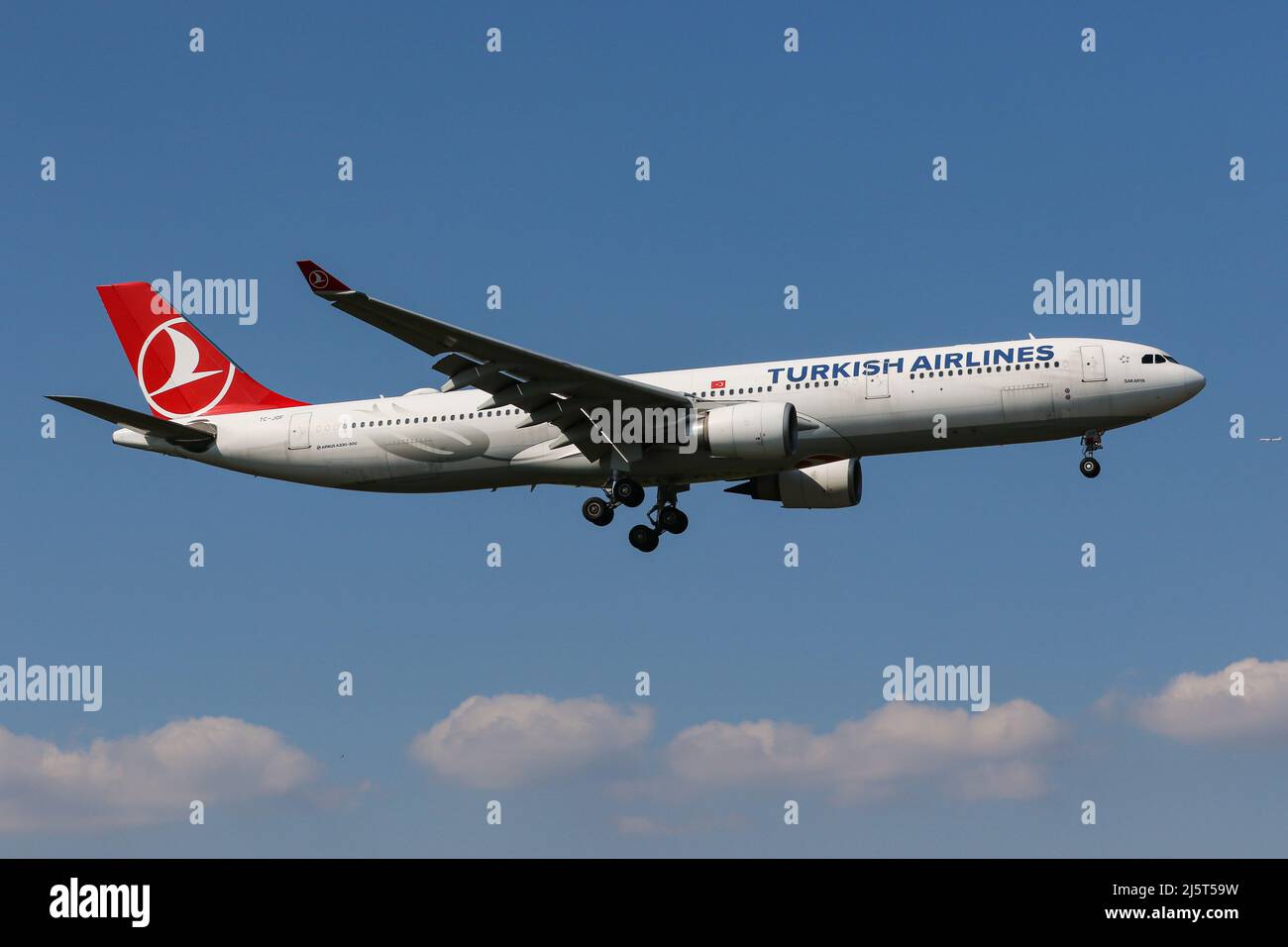An Airbus A330 operated by Turkish Airlines arrives at London Heathrow Airport Stock Photo