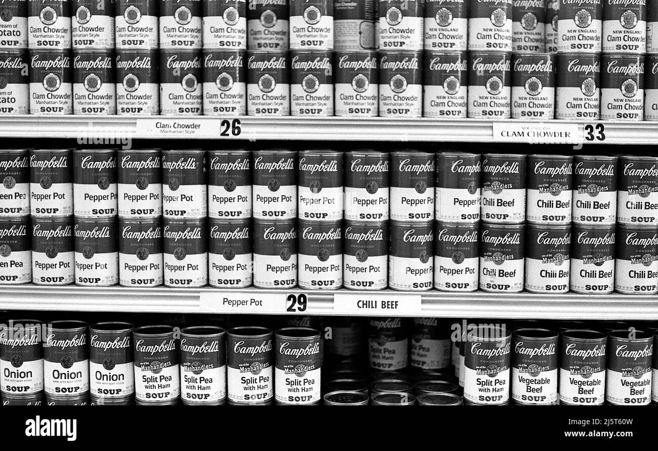 Campbell's Soup cans on shelf in a supermarket Stock Photo