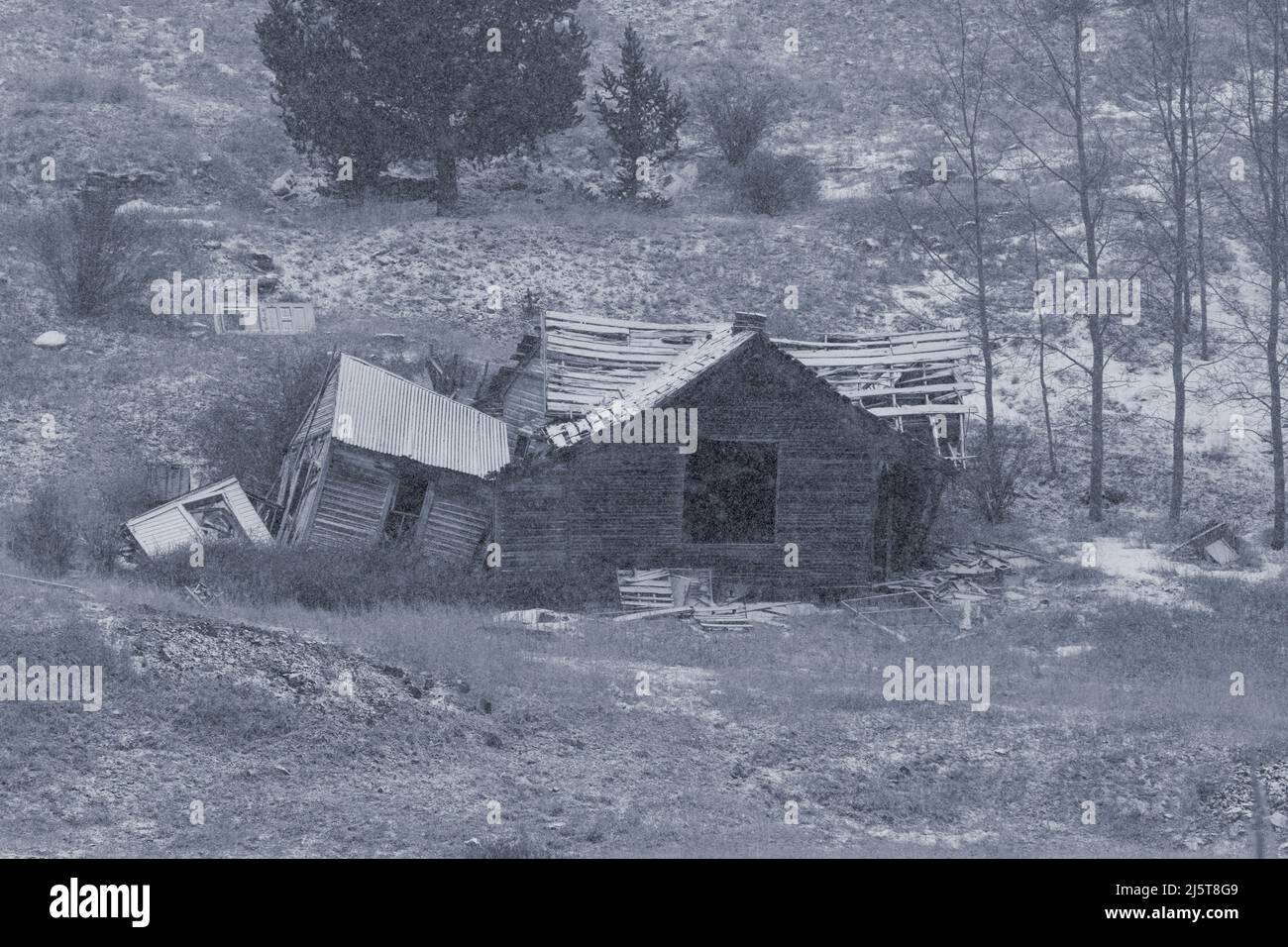 Gold mines of the Cripple Creek / Victor historic mining district on a snowy spring day Stock Photo