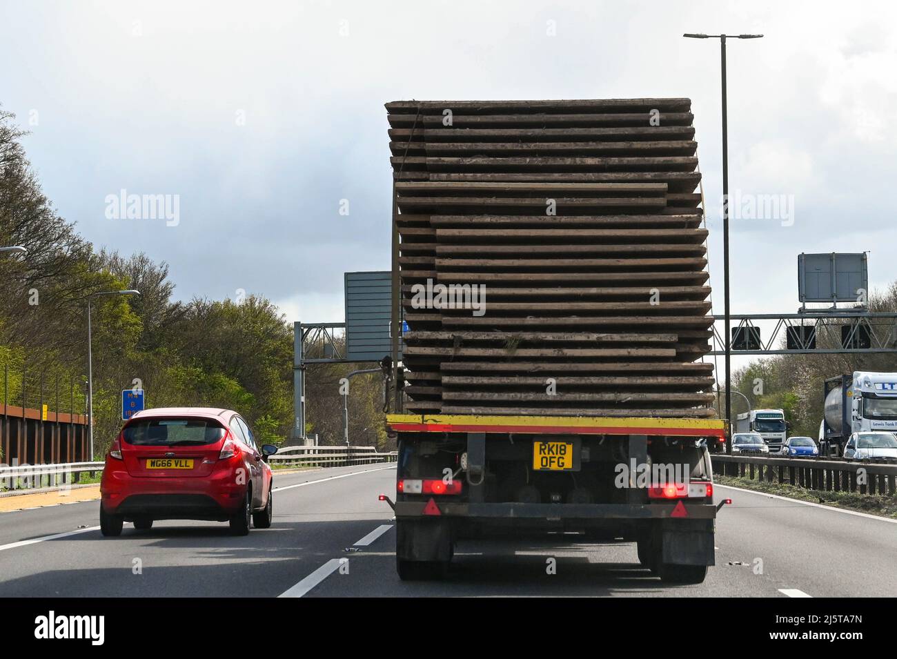Bristol, England - April 2022: Rear view of a lorry with a tall stack ...