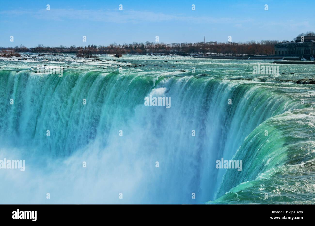 Close view of Niagara Falls waters falling down Stock Photo