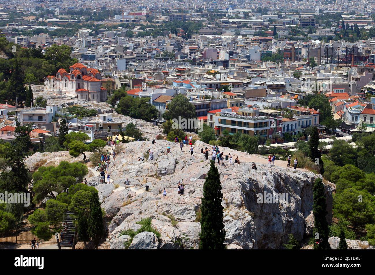 ATHENS, GREECE - JUNE 29: Areopagus (Mars Hill) behind Athens City from Acropolis on June 29, 2012 in Athens, Greece. Mars Hill is a prominent site located 140 feet below the Acropolis. Stock Photo