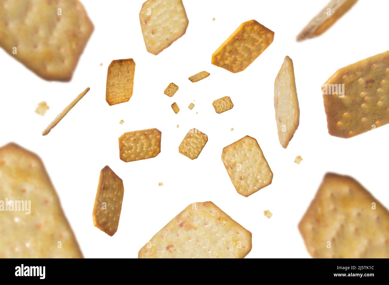 Collection of Crackers falling isolated on white background. Selective focus Stock Photo