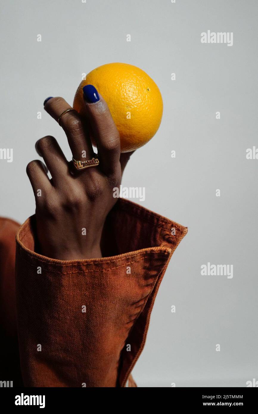 Orange and gold jacket hi-res stock photography and images - Alamy