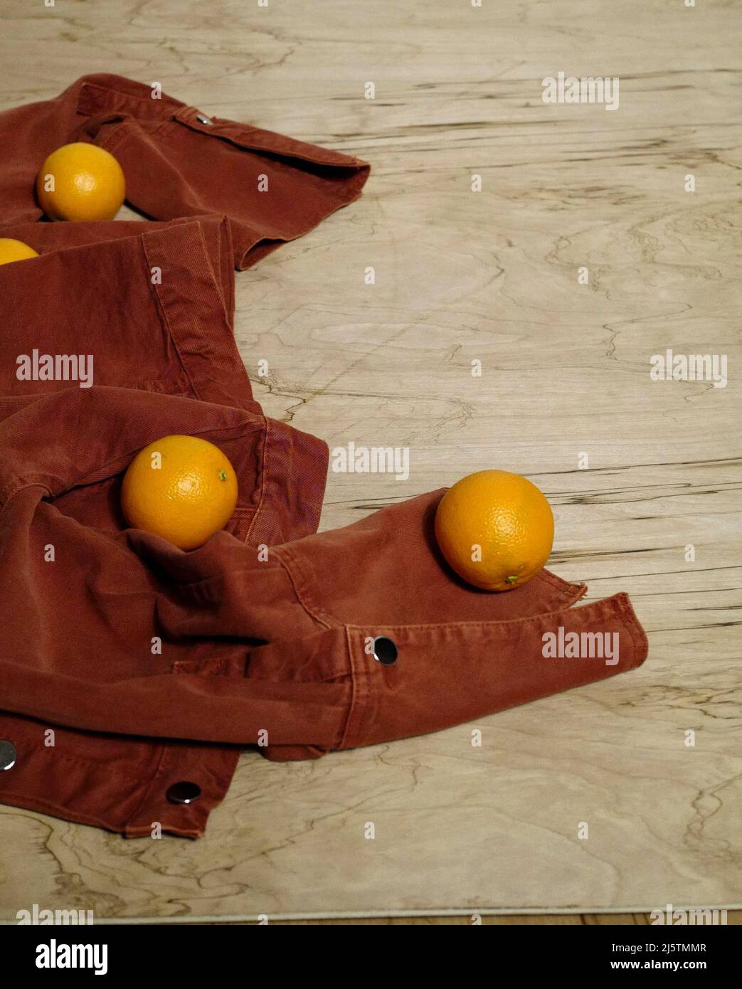 Orange and gold jacket hi-res stock photography and images - Alamy