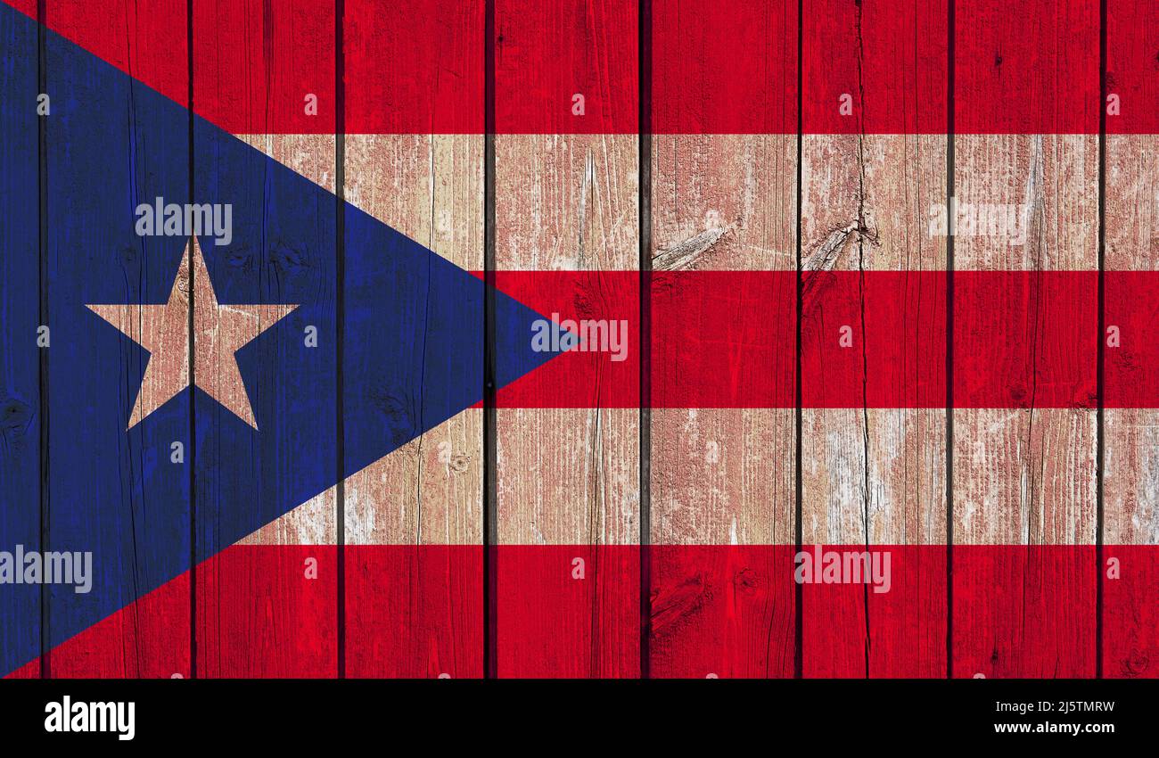Top view of Old Painted Flag of Puerto Rico on Dark Wooden Fence, wall ...