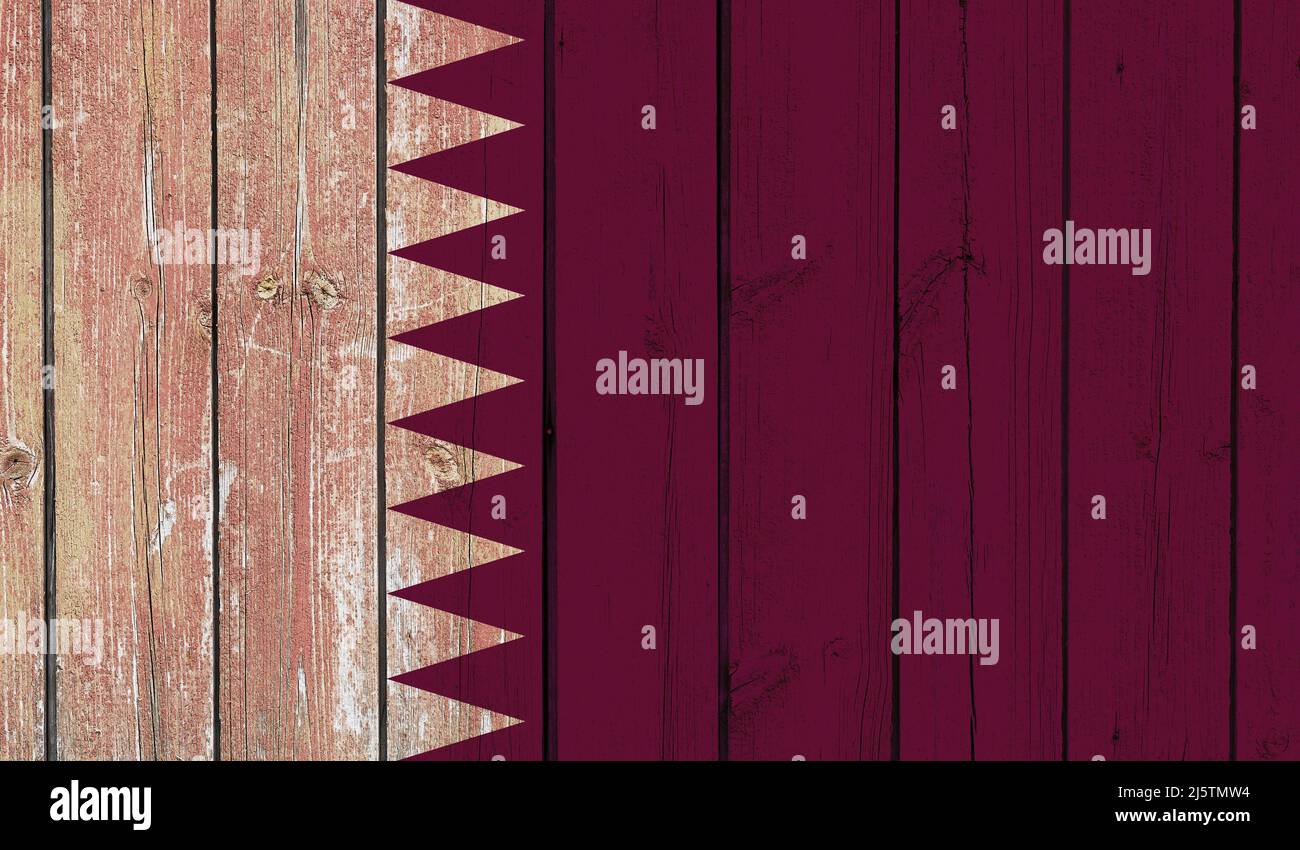 Top view of Old Painted Flag of Qatar on Dark Wooden Fence, wall ...