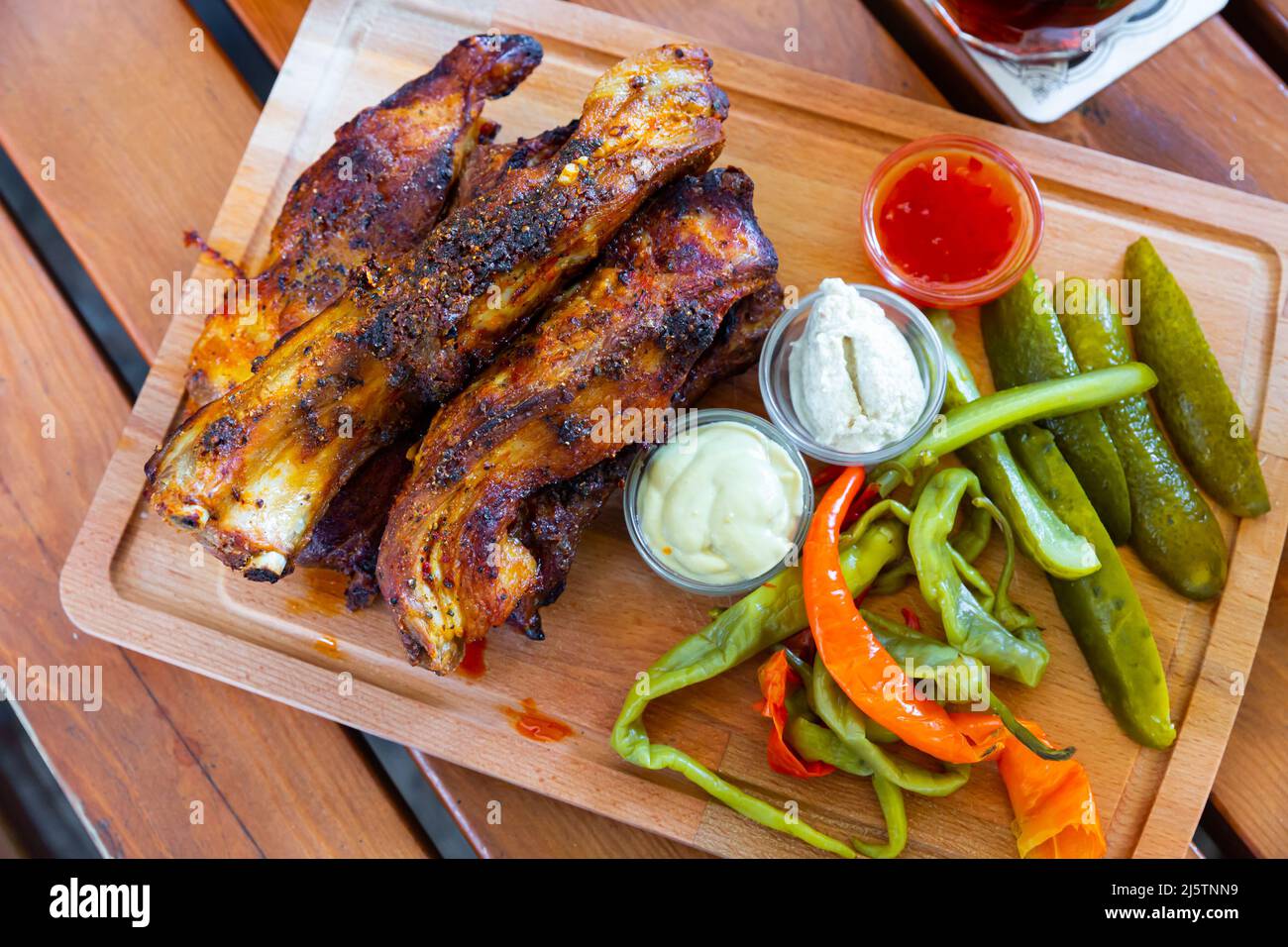 Baked pork ribs with horseradish, mustard, pickles Stock Photo Alamy