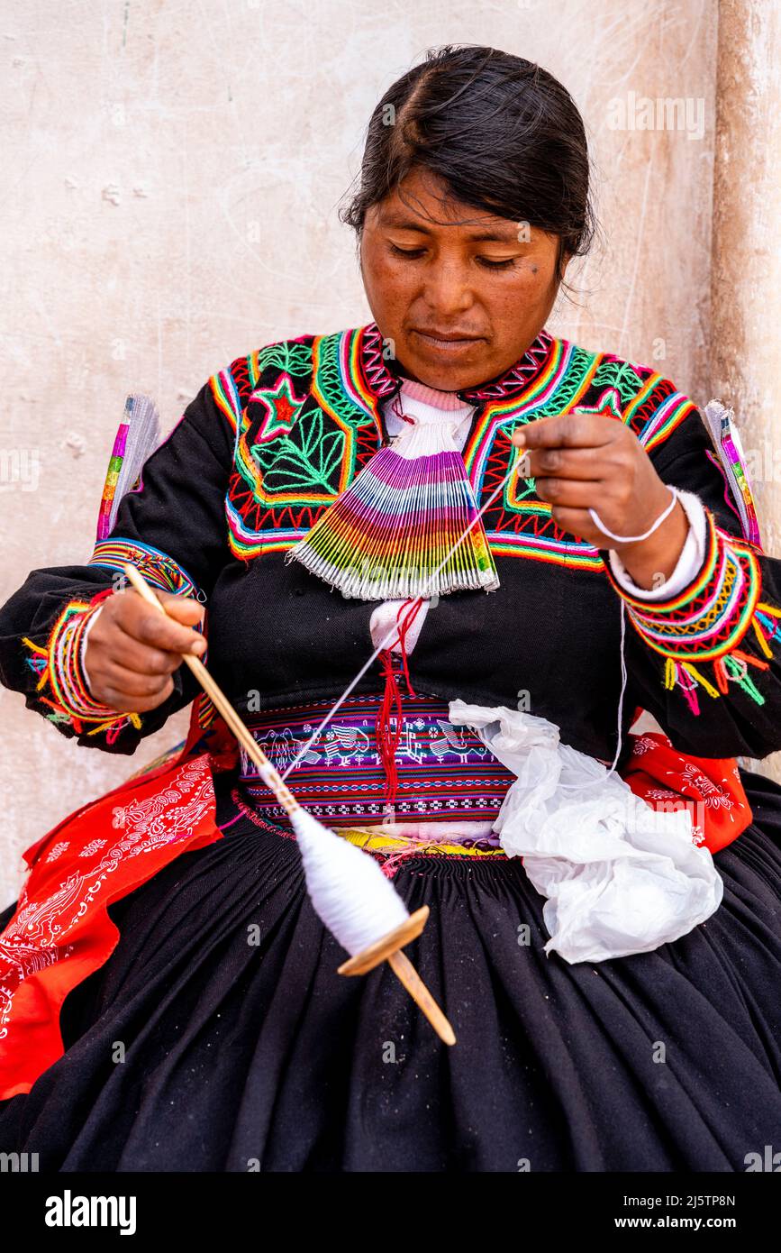 A Taquileno Woman Spinning Wool, Taquile Island, Lake Titicaca, Puno, Peru. Stock Photo