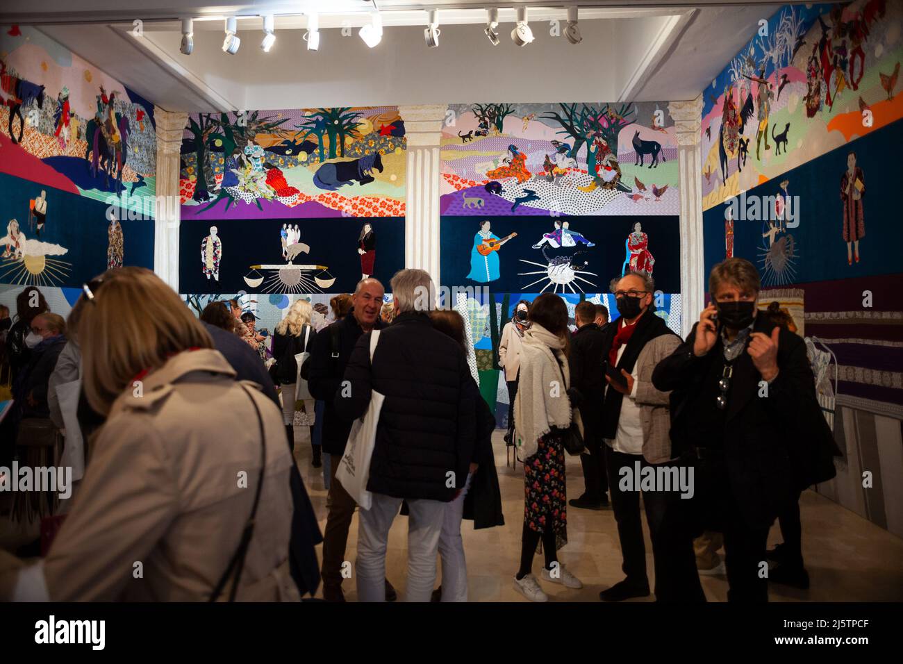 VENICE, ITALY - April 20: Visitors at the Polish Pavilion. The title of the project is: Re-enchanting the World by the artist Małgorzata Mirga-Tas Stock Photo