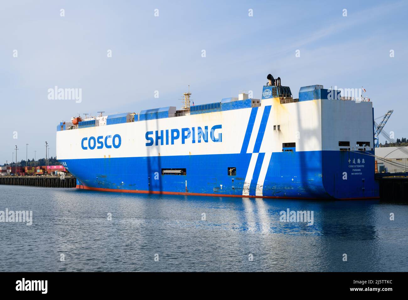 Tacoma, WA, USA - April 23, 2022; Cosco Tengfei vehicle carrier docked at the Port of Tacoma.  She is registered and sails under the flag of Panama Stock Photo