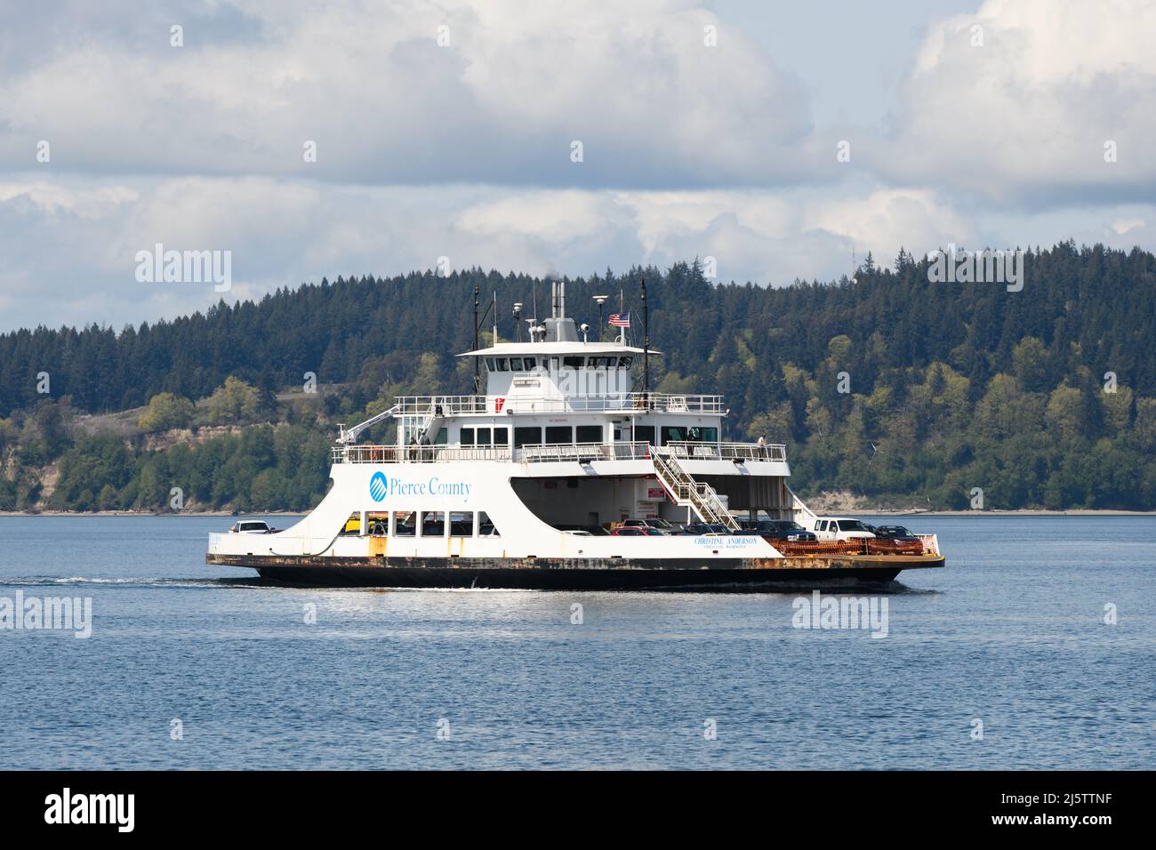 Steilacoom, WA, USA - April 23, 2022; Pierce County small Car Ferry Christina Anderson crossing Puget Sound on a partly sunny day Stock Photo