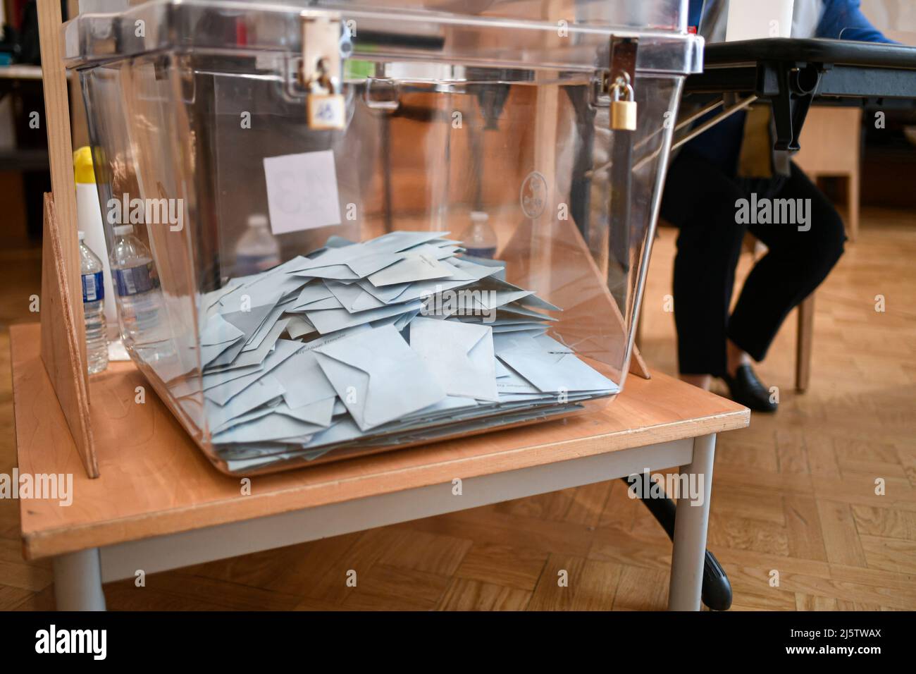 Paris, France, on April 24, 2022. Illustration picture shows ballot papers in their envelope placed in the ballot box in Paris, France, on April 24, 2022. French voters head to the polls to vote for the second round of the presidential election, to elect their new president of the Republic between Emmanuel Macron and Marine Le Pen. Photo by Victor Joly/ABACAPRESS.COM Stock Photo