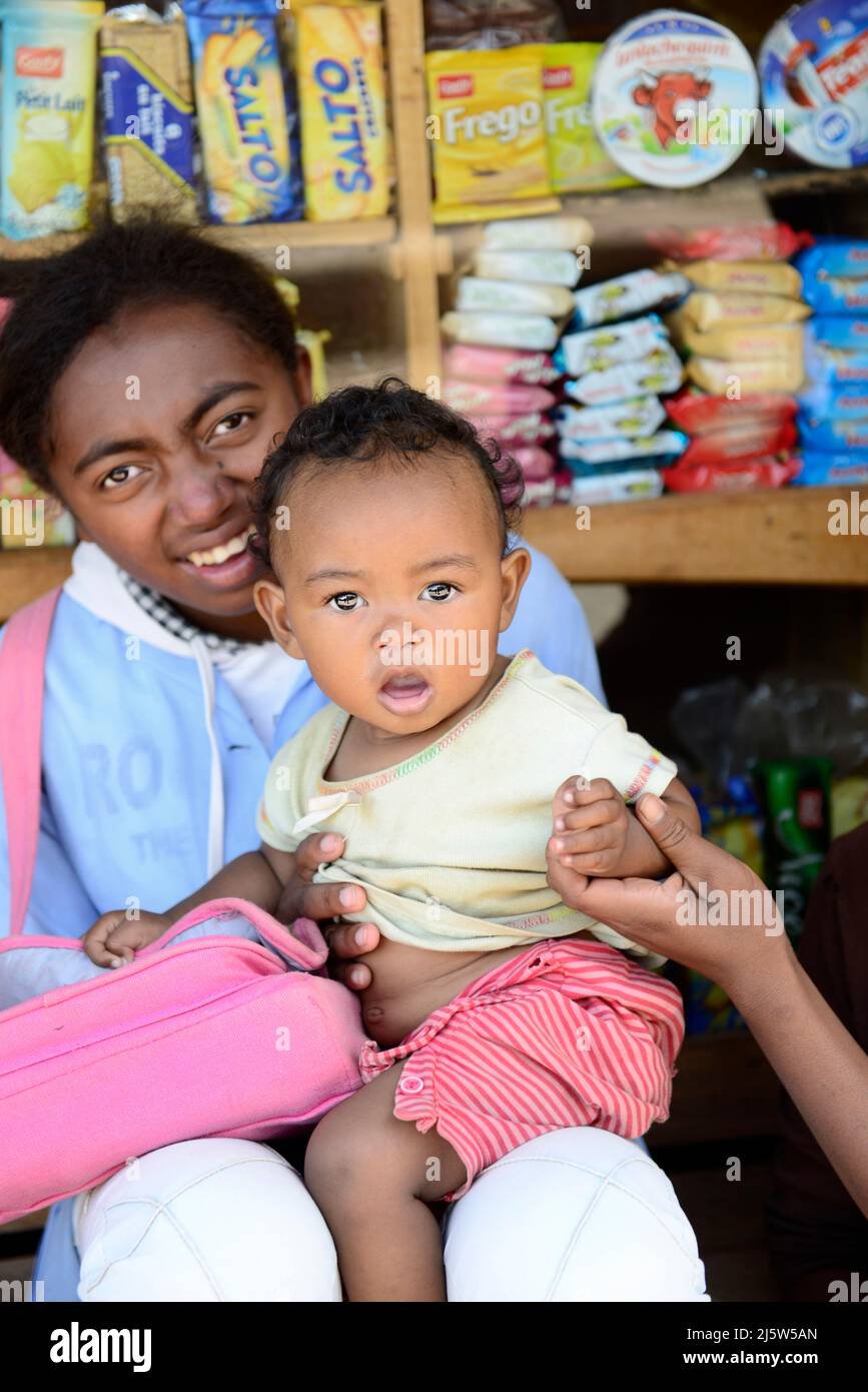 A Malagasy woman with her baby. Photo taken in the Ambohimanga region in central Madagascar. Stock Photo