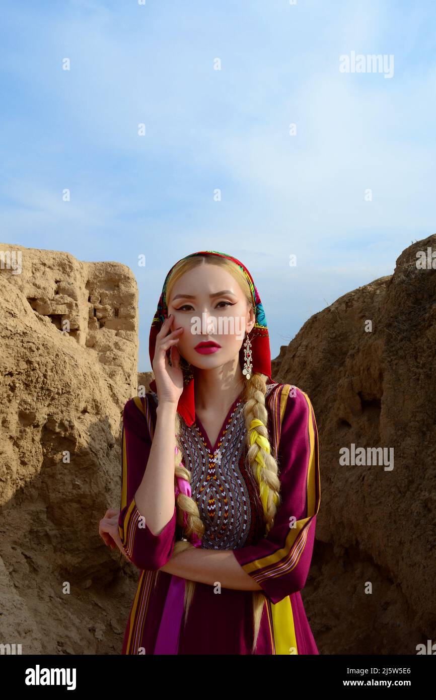 Turkmen Girl In Pink Dress Stock Photo