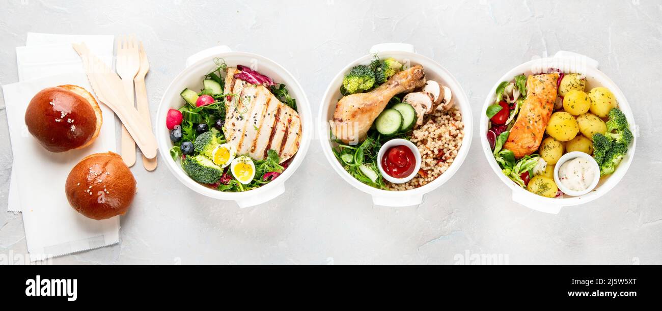 Healthy meal prep in lunch boxes on light background. Dieting eating