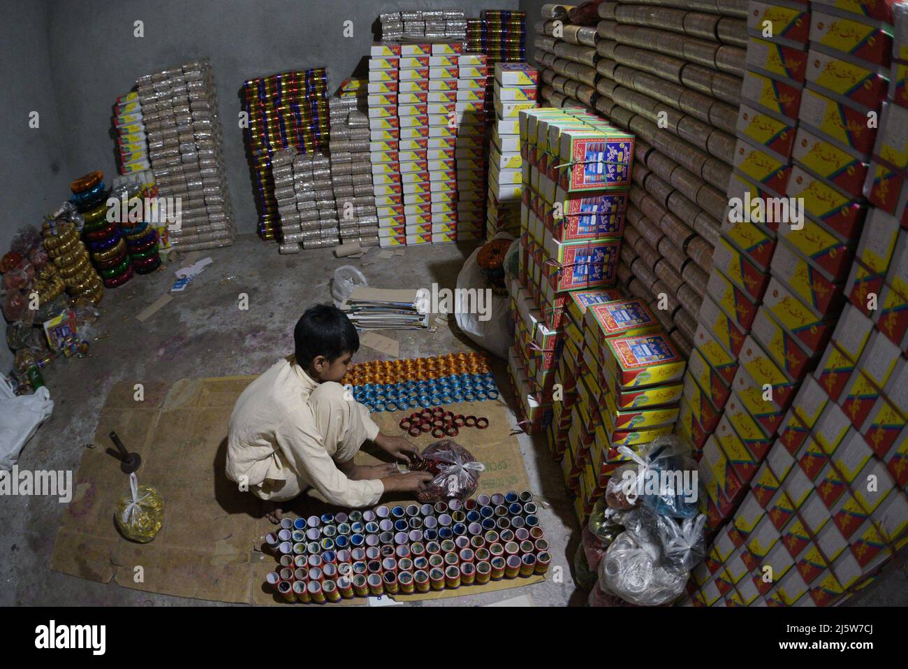 Pakistani Kashif Bangles Factory's worker are busy preparing metal ...
