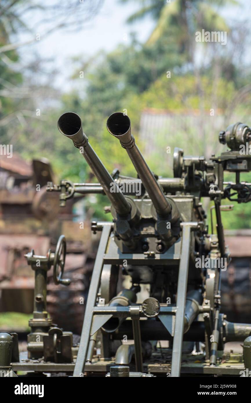 37mm anti aircraft artillery in the outdoors museum in Ho chi Minh city, Vietnam, close up double barrelled gun Stock Photo