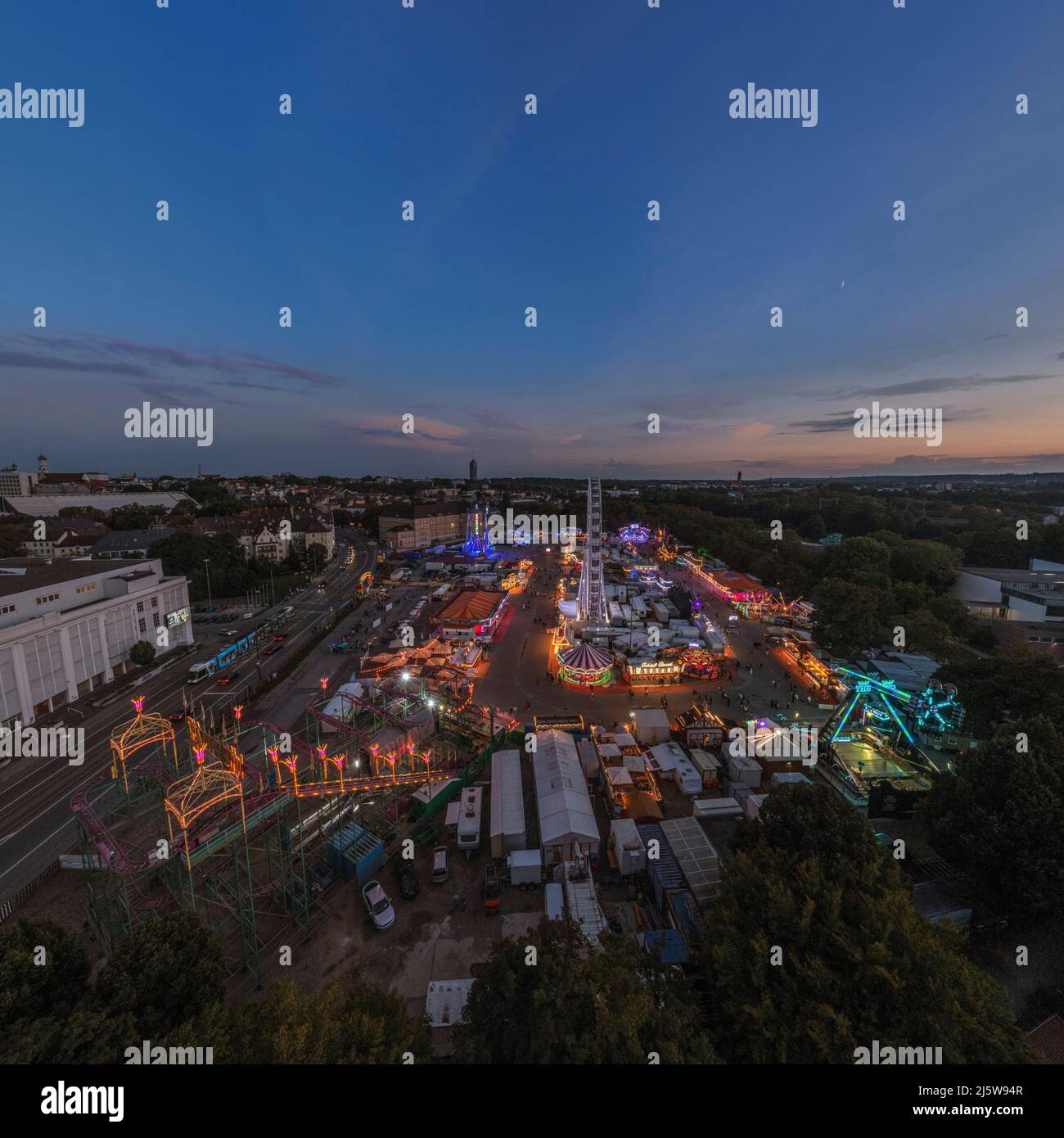 Aerial view to the Plärrer at nightfall during funfair time Stock Photo