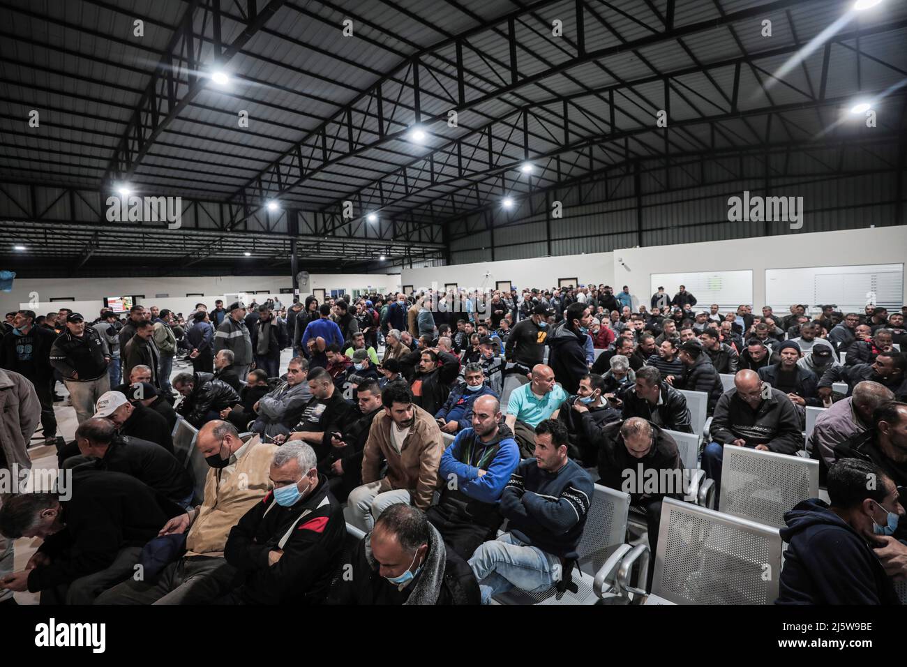 Beit Hanoun, Palestine. 25th Apr, 2022. Palestinian workers wait at the last station in Beit Hanun in the northern Gaza Strip, before reaching Israel through the Erez crossing to work (Photo by Nidal Alwaheidi/SOPA Images/Sipa USA) Credit: Sipa USA/Alamy Live News Stock Photo