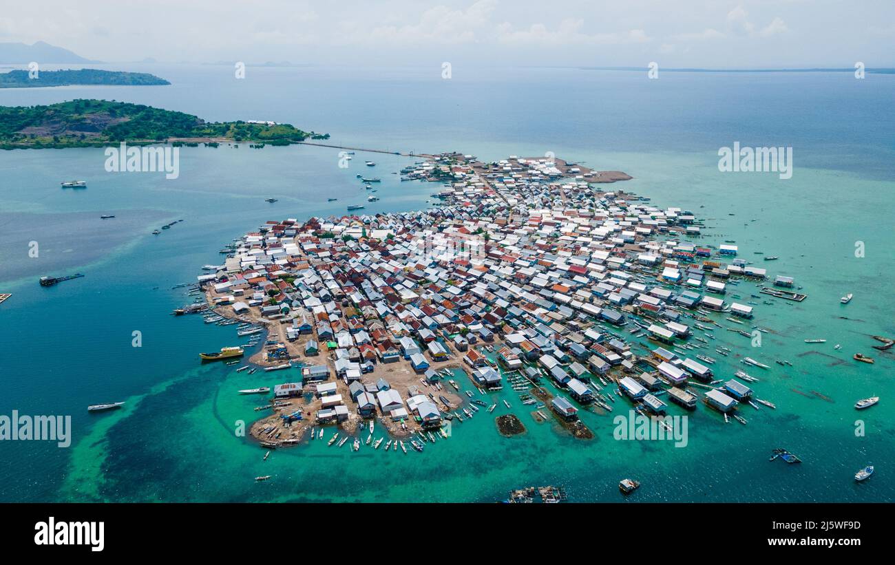 Aerial shot of Bungin island is the MOST POPULATED Island in the world after Earthquake 7.0 M Lombok Stock Photo