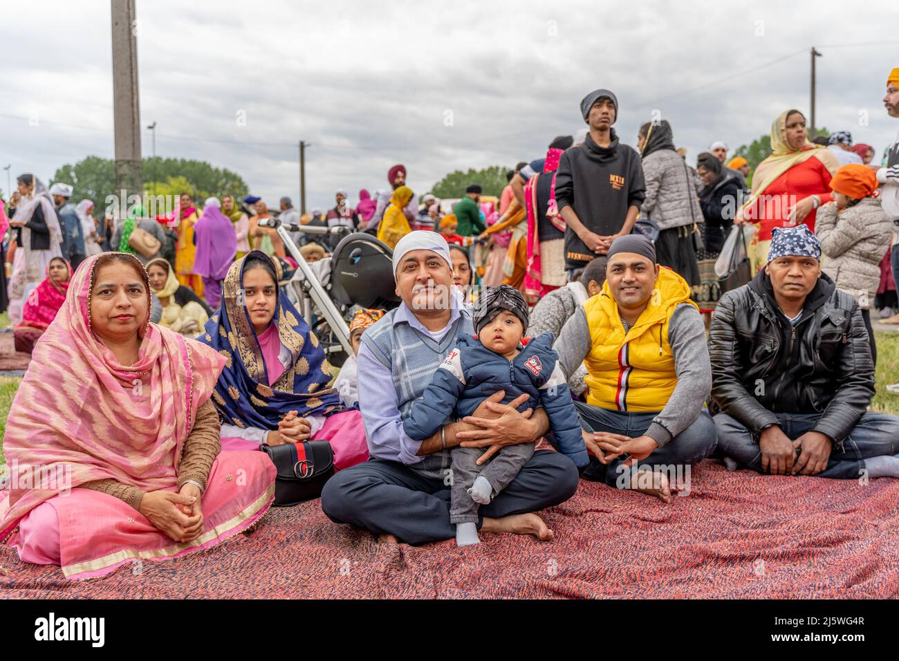 CREMONA, ITALY APRIL 2022 large family of the Sikh monotheism