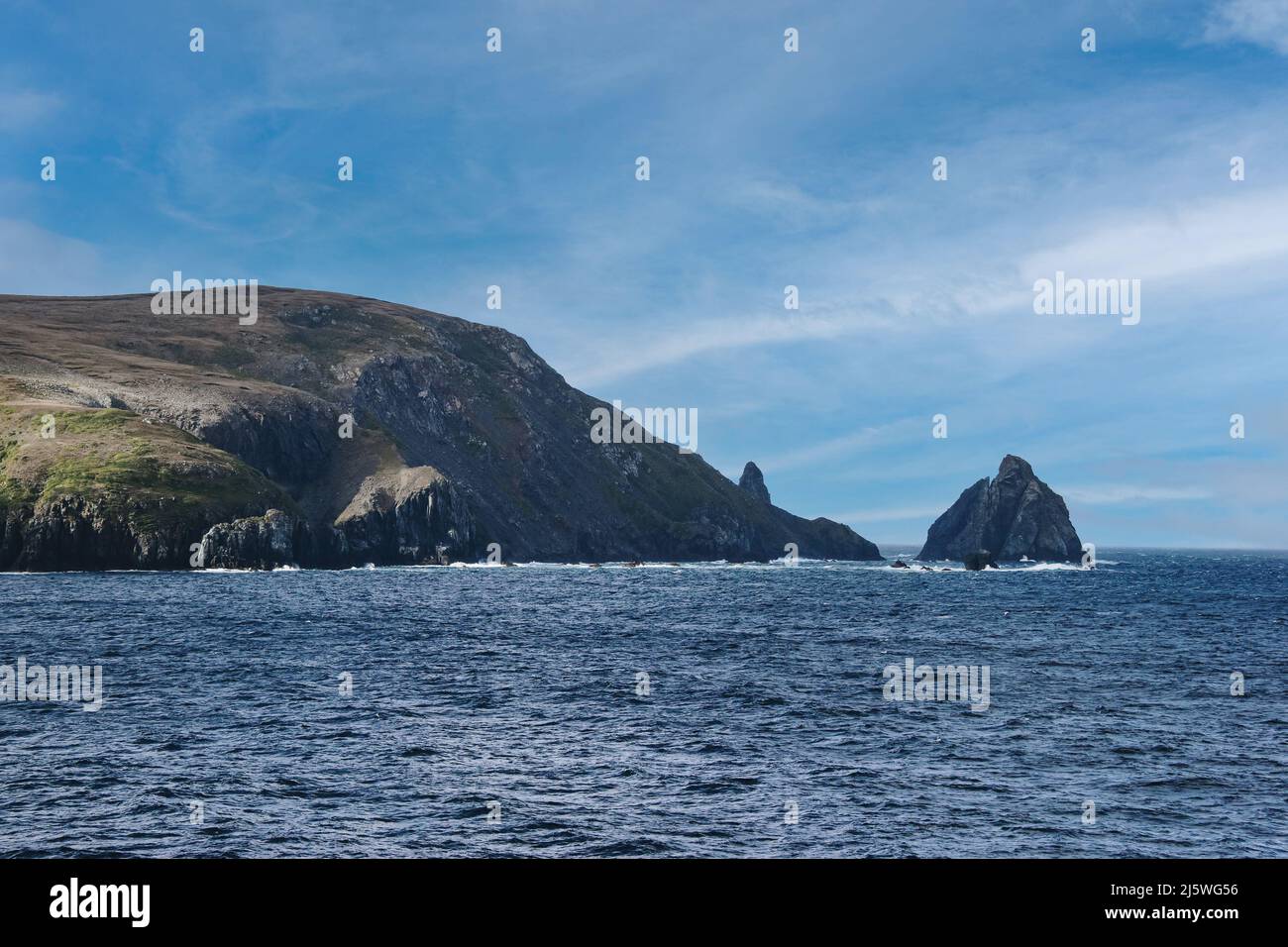 sea and coast at Cape Horn against blue sky Stock Photo