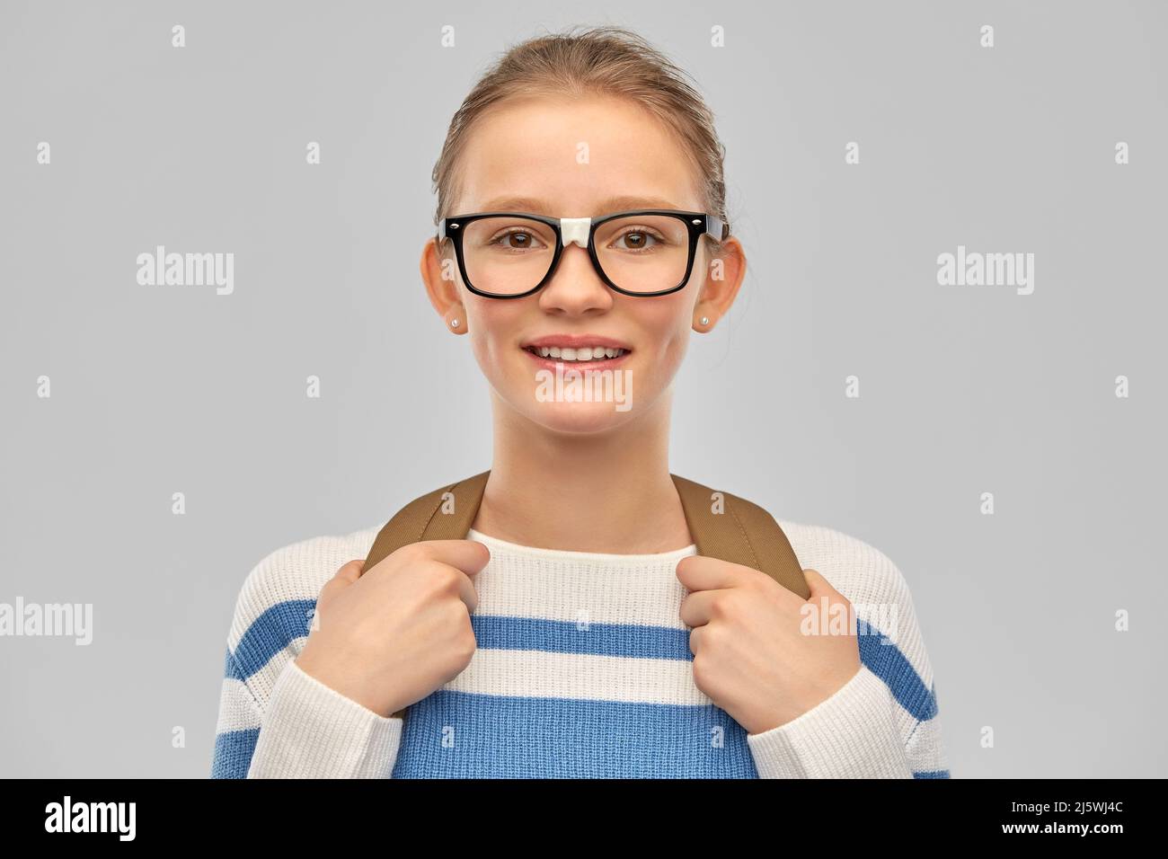 smiling teenage student girl with school bag Stock Photo - Alamy