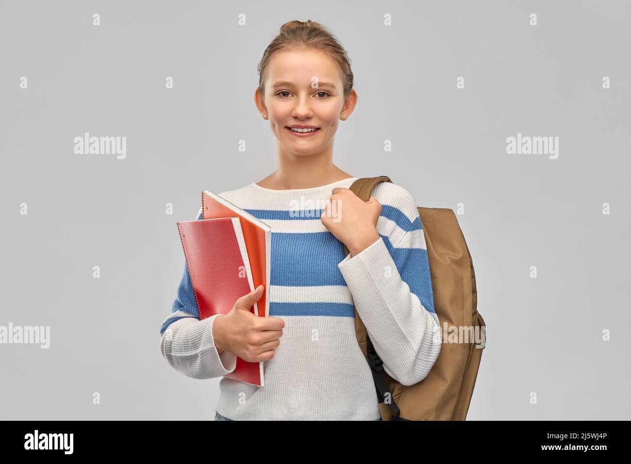 teenage student girl with school bag and notebooks Stock Photo - Alamy