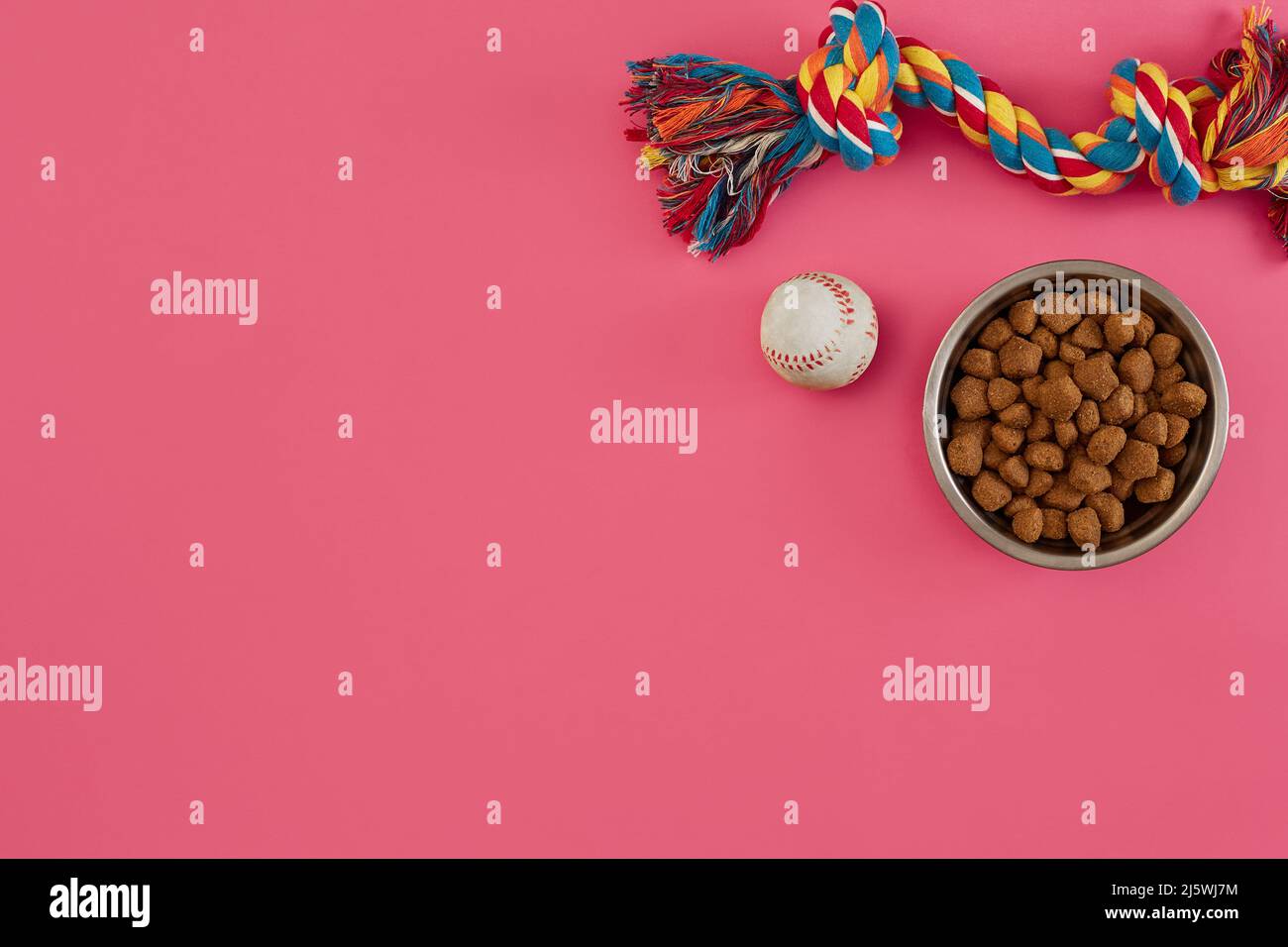 Toys -multi coloured rope, ball and dry food. Accessories for play on ...