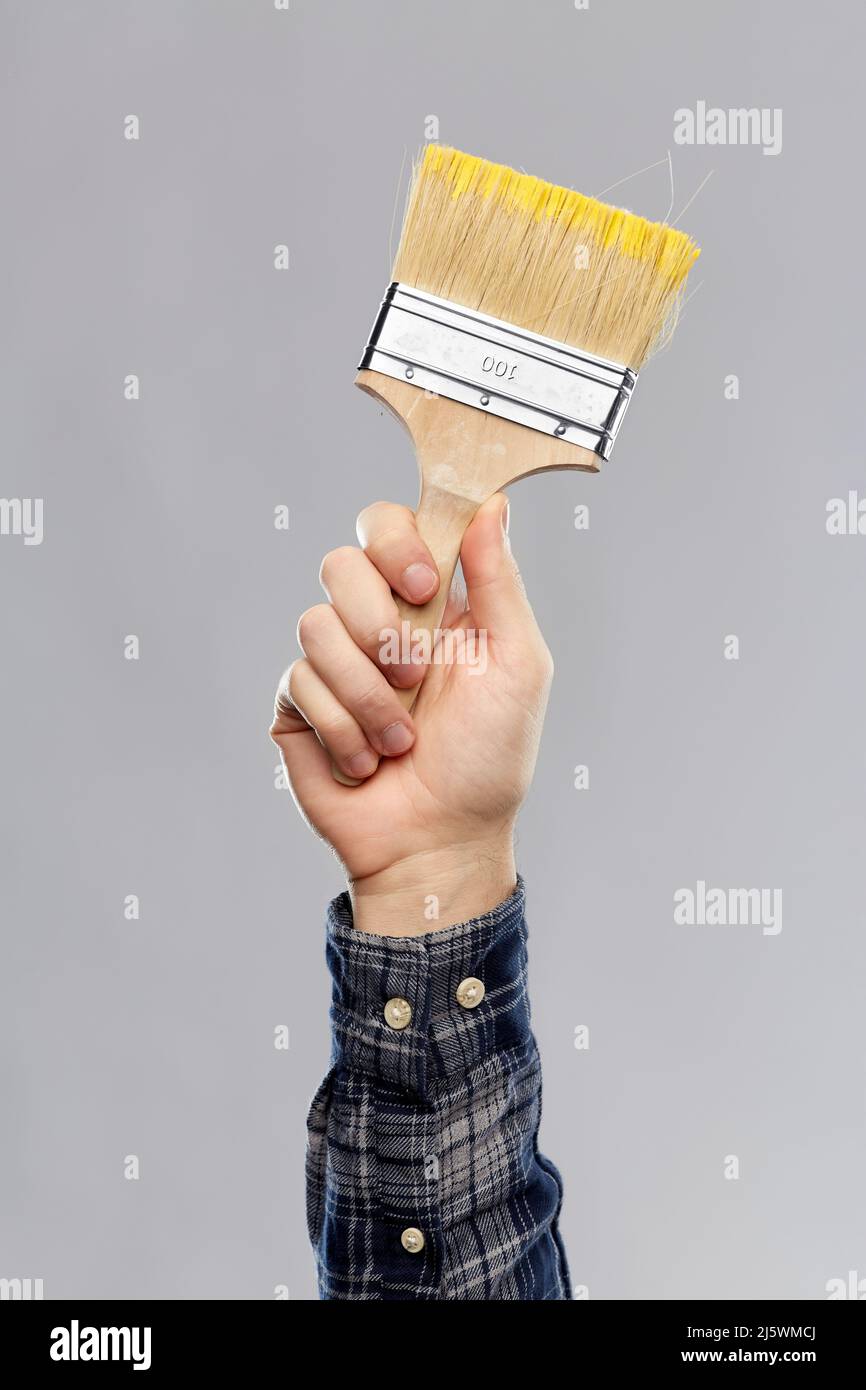 Hand holding paint brush hires stock photography and images Alamy