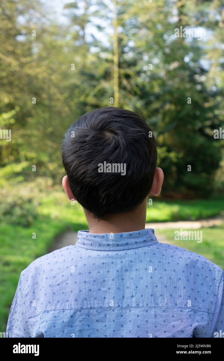 Rear view of 10 years old boy Stock Photo