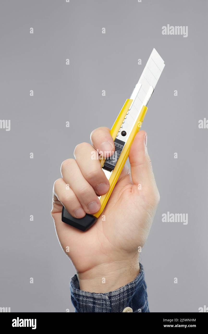 Hand holding knife hi-res stock photography and images - Alamy