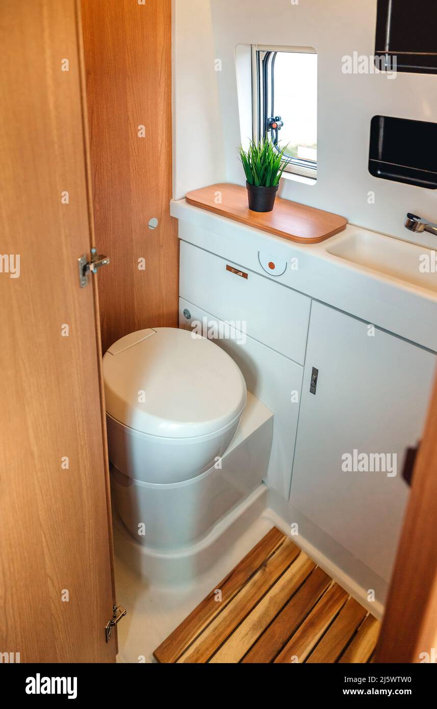 Campervan bathroom interior with toilet Stock Photo