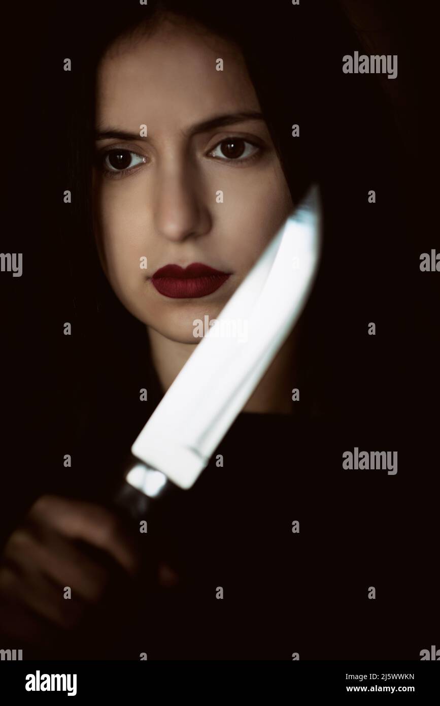 Hand Knife Atmospheric Hi Res Stock Photography And Images Alamy   Dangerous Woman Holding A Knife 2J5WWKN 